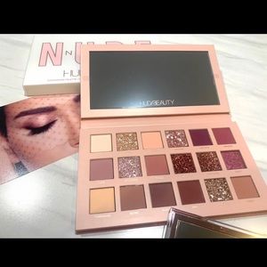 3 Huda beauty eyeshadow pallets. Née nude, Naughty, and retrograde